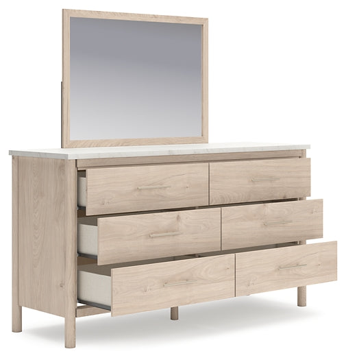 Cadmori Queen Upholstered Panel Bed with Mirrored Dresser and Chest